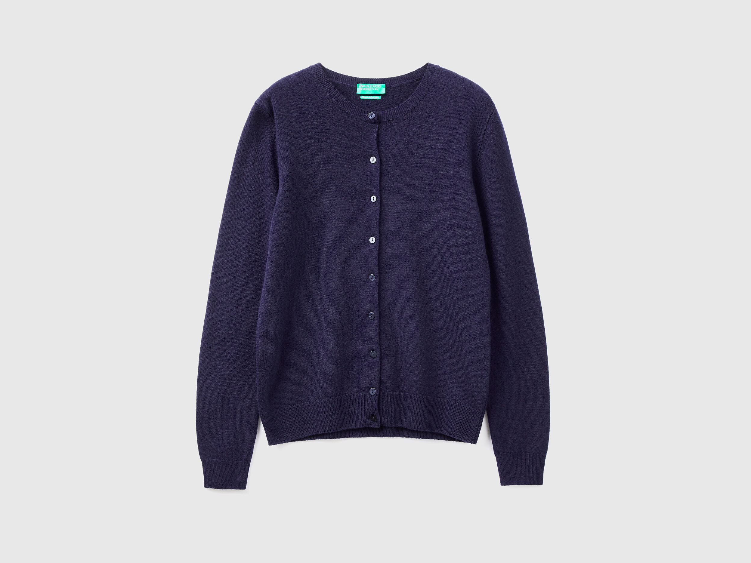 Dark blue crew neck cardigan in pure Merino wool