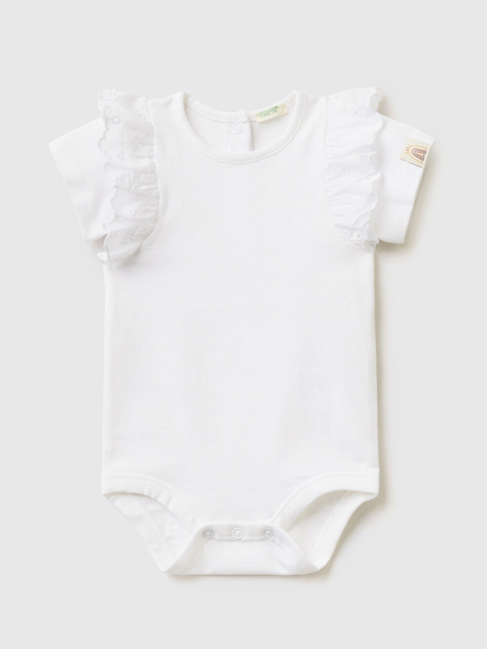 Onesie with flap in broderie anglaise