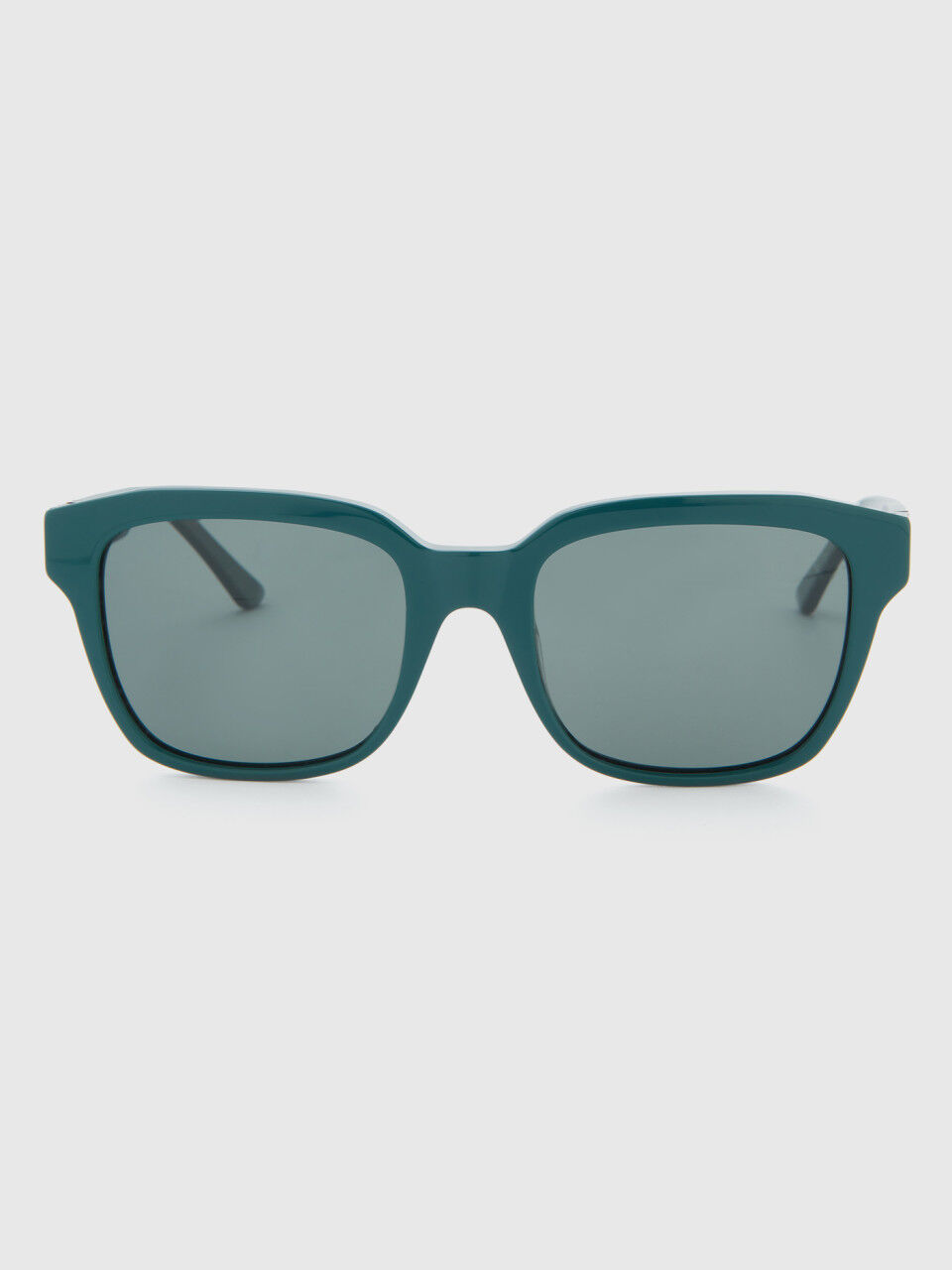 Green sunglasses with logo