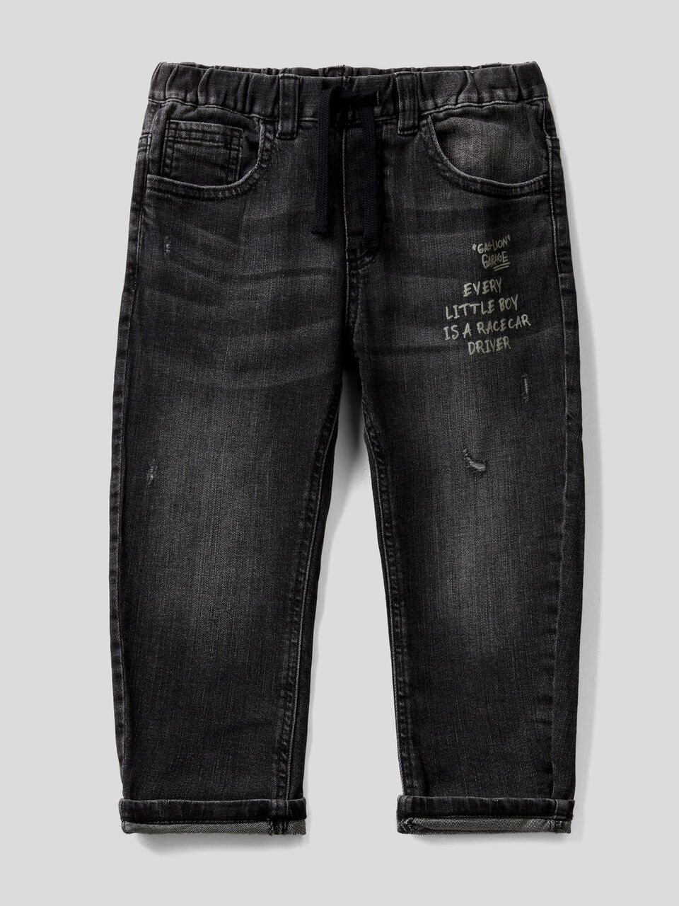 Jeans with tears and print image number 1