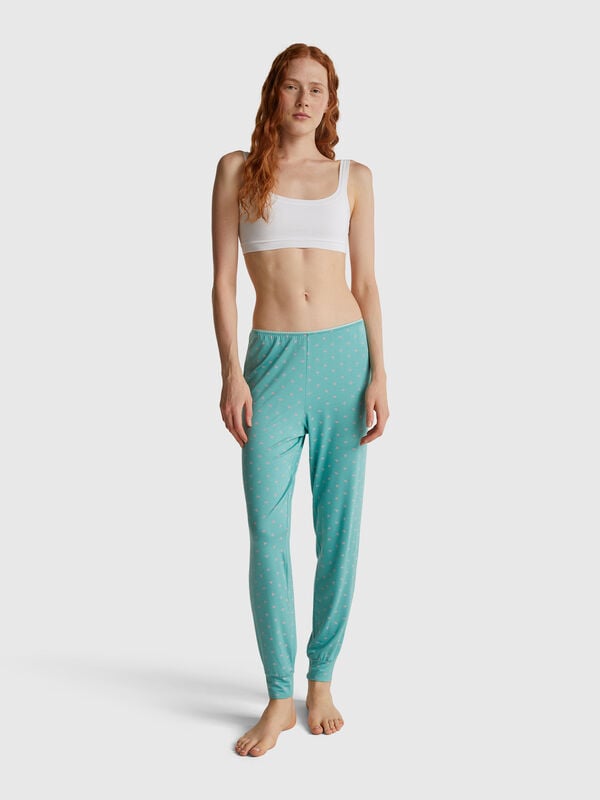 Light blue trousers with heart print Women